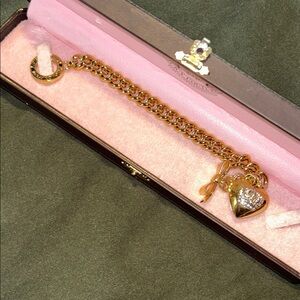 Gold plated juicy couture bracelet